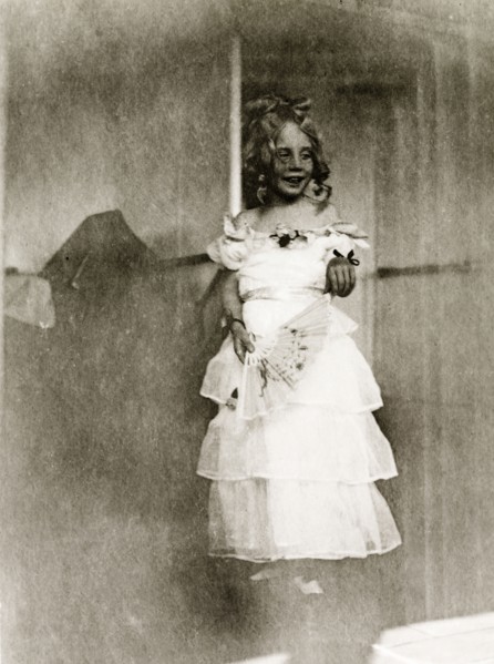 Girl in fancy dress aboard RMS Arundel Castle. Portrait of a young girl dressed in costume for a