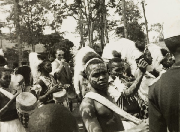 Drummers in traditional dress at the Royal Show. A group of Kenyan men wear traditional fur