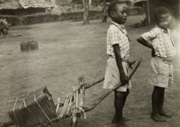 Boys at Mombasa Intermediate School. Two young boys in uniform play outside Mombasa Intermediate