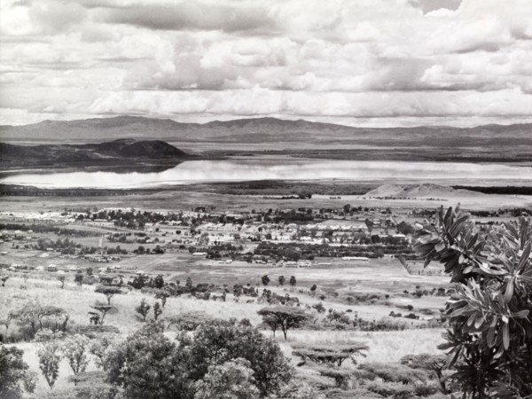 View of Lake Nakuru, Kenya. Panoramic view over rolling scrubland looking towards Lake Nakuru,