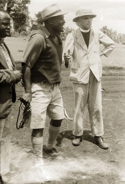 Pro-government Kikuyu and a Catholic priest. A loyal Kikuyu chief talks to a Roman Catholic priest