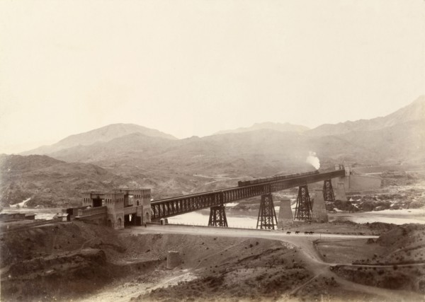 Iron girder bridge at Attock. A freight train crosses the iron girder bridge at Attock over the
