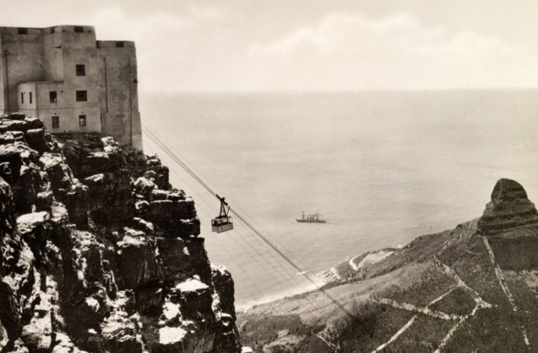 Cablecar at Table Mountain. A cablecar en route at Table Mountain. The famous Lion's Head mountain