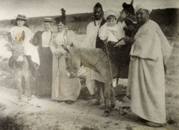 The Russi children on a donkey ride. A European governess and two Moroccan servants accompany Mrs