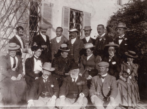 A British group in Morocco. A group of British men and women dressed in their best attire, line up