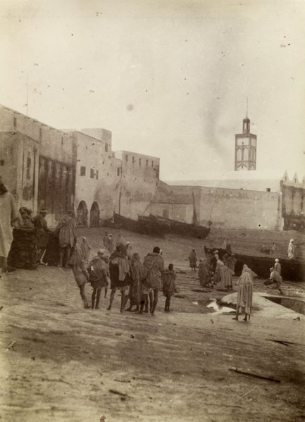 Harbourside market place, Safi. Morrocan people mill about at a market place near the harbour in