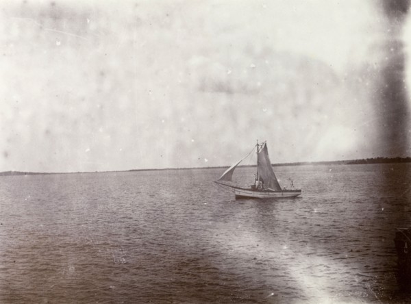 Mail boat on Lake Victoria. A small mail boat sails of the coast of Lake Victoria. Lake Victoria,