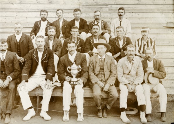 Premier Diamond Mine cricket team. Cricket team of the Premier Diamond Mine. The man in the striped