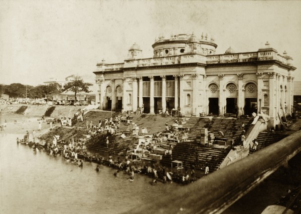Bathing ghat on the Hooghly River. Hindu devotees bathe at a ghat (stepped wharf) on the banks of