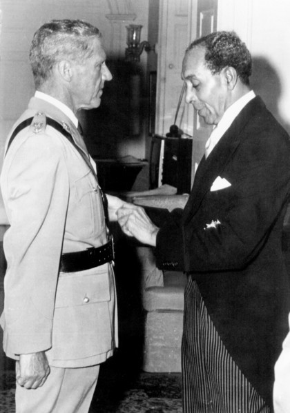 Leslie Slater receives his OBE. Sir Deighton Lisle Ward, the Governor General of Barbados between