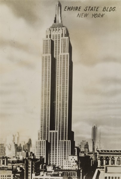 Empire State Building. The Art Deco-style Empire State Building towers over neighbouring buildings.