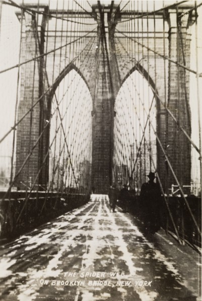 "The Spider Web on Brooklyn Bridge". View along the pedestrian path of Brooklyn Bridge. A printed