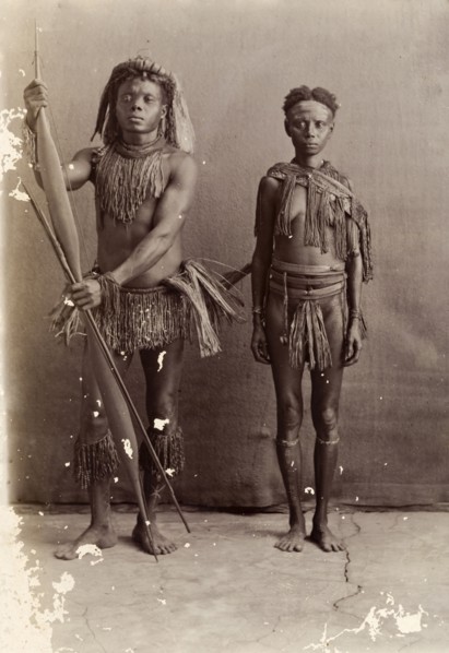 Couple from the Andaman Islands. A man and a woman from the Andaman Islands stand, facing the