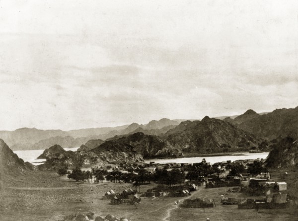 Valley outside Muscat. View across a valley outside Muscat, showing a village surrounded by