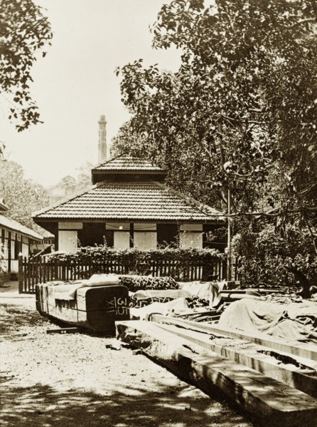 A Bombay dockyard. Discarded timber outside a government dockyard belonging to the Royal Indian