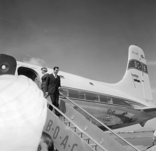 Arrival of Aga Khan IV. Aga Khan IV, Prince Karim Al Husseni, disembarks from a plane at a Kenyan