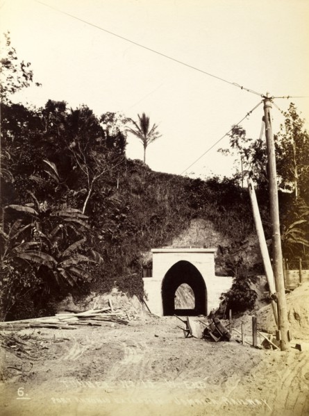 Railway tunnel 'No. 15'. Discarded wheelbarrows and timber litter the entrance to railway tunnel