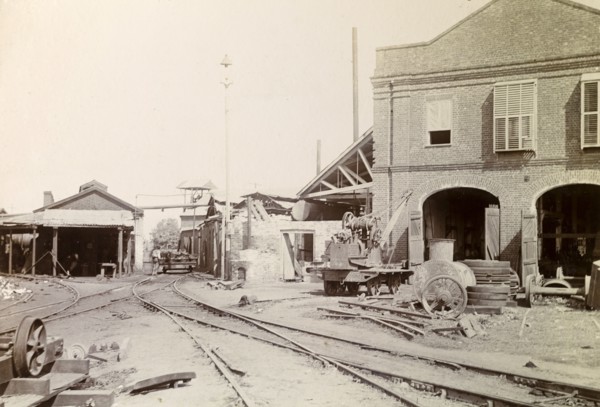 Railway sidings, Jamaica. Railway sidings criss-cross at a junction surrounded by railway utility