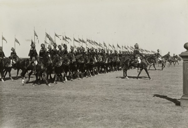 Indian cavalry parade at Delhi. An Indian cavalry regiment march past with standards at the