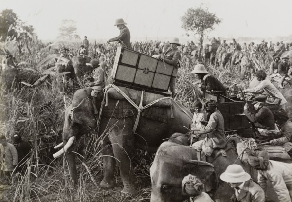King George V surveys the hunt. King George V (r.1910-36) leans from the howdah on the back of his