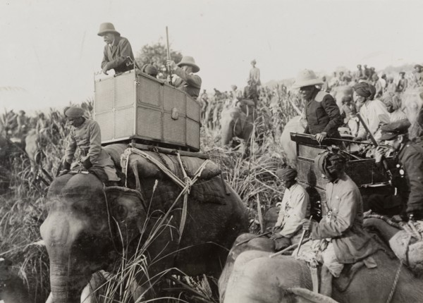 King George V on a hunt. King George V (r.1910-36) leans from the howdah on the back of his