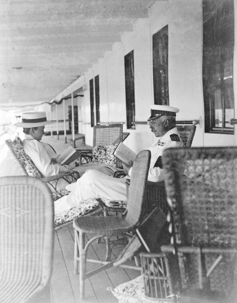 Duke and Duchess of Connaught on deck. The Duke and Duchess of Connaught sit in lounge chairs,