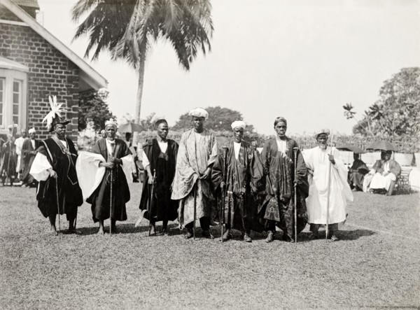 Bechuanaland chiefs. A group of finely dressed Bechaunaland chiefs pose for the camera holding