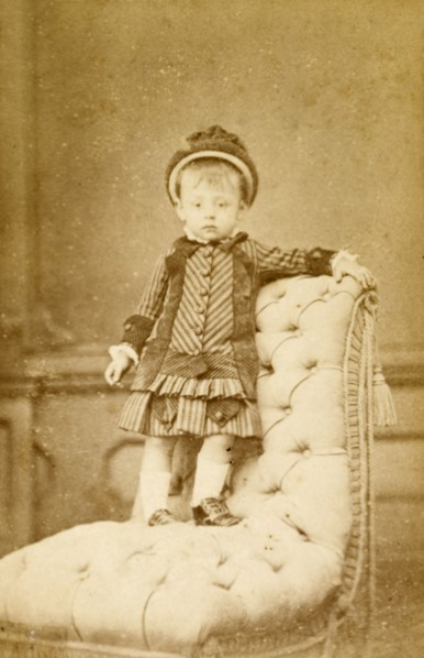Juanito', aged 18 months. Studio portrait of a young boy named 'Juanito', aged 18 months.