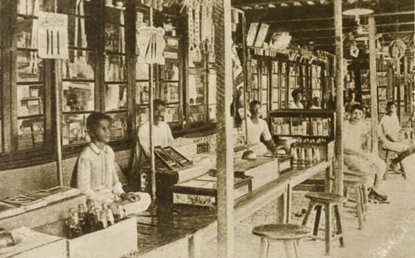 Bazaar at Calcutta. Traders wait for customers at a bazaar. Their stalls appear to be located