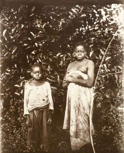 Inhabitants of Bioko. Portrait of a young woman and a boy, inhabitants of the island of Bioko.