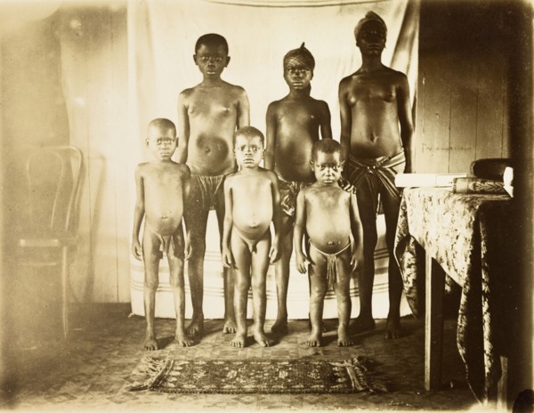 Inhabitants of Bioko. Portrait of six semi-naked children from Bioko, posed standing against a