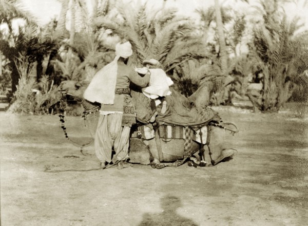 Margaret Lawrence prepares to ride a camel. Margaret Lawrence (b.1904), the daughter of Phyllis and