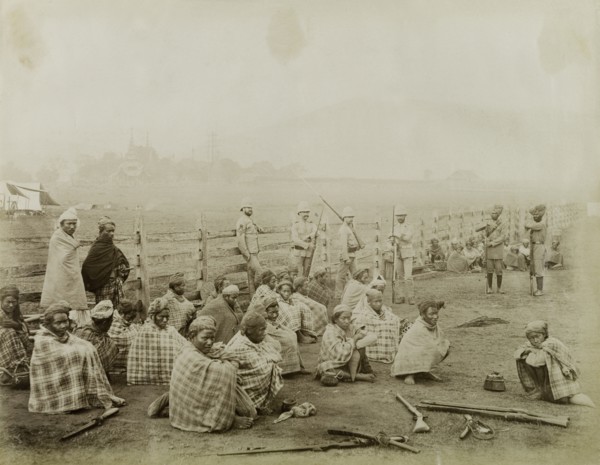 Burmese rebels surrender at Wuntho. Captured Burmese rebels surrender their arms to British forces