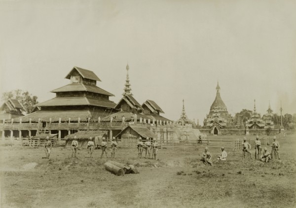 Wuntho Palace and the 'Pon-gyi kyaung'. British Army soldiers pose in front of Wuntho Palace (left)
