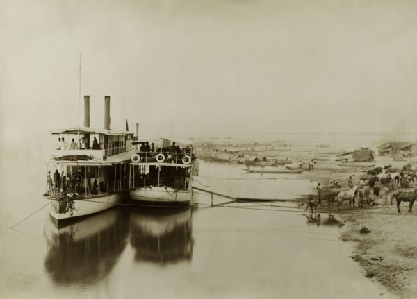 Ferries on the Irrawaddy River. Two ferries containing soldiers from the Second Mountain Battery of
