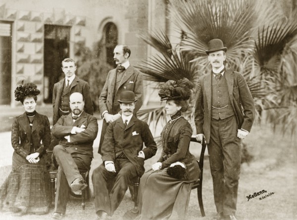 The Lawleys visit the Tennysons. Group portrait of Sir Arthur and Lady Annie Lawley (seated third
