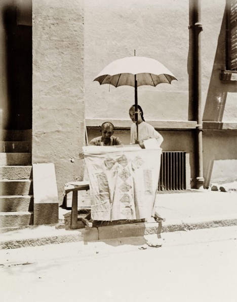Letter-writing service on a Hong Kong street. A street trader offering a letter-writing service