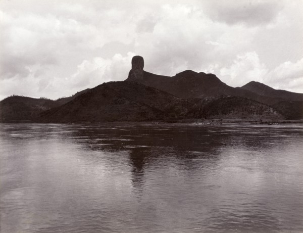 Monk's Head Rock' across the Xijiang River. View across the Xijiang River, featuring an unusual