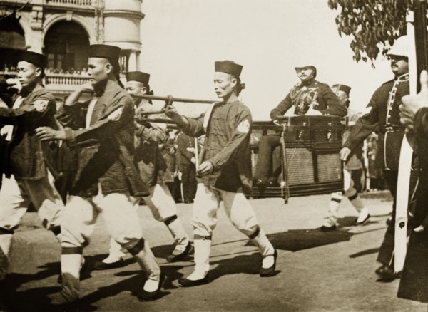 The Duke of Connaught visits Hong Kong, 1906. A team of Chinese bearers, wearing a uniform of