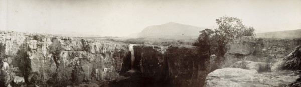 Sabie River waterfall. A view of a cliff along the Sabi River, with a waterfall cascading over the
