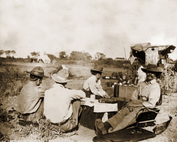 Captain Lawley relaxes in camp. Captain Arthur Lawley (1860-1932) (front right) rests with fellow