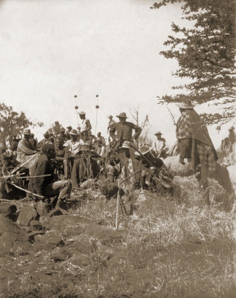 A Matabele indaba at Cecil Rhodes' farm. Matabele (Ndebele) indunas (chiefs) attend an indaba