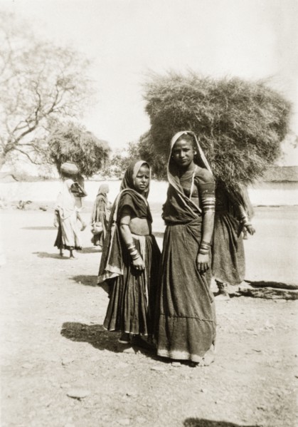 Two Indian women in Udaipur. Portrait of two young Indian women, dressed in traditional saris that