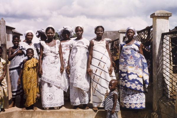 Celebrating the third anniversary of Ghanaian independence. A group of traditionally dressed