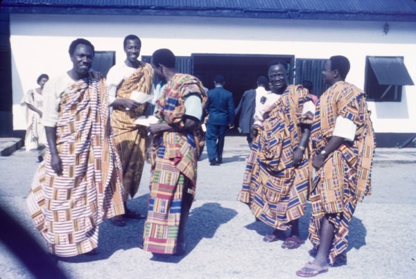 Ghanaian men wearing kente cloth. A group of Ghanaian men wear traditional kente cloth at a