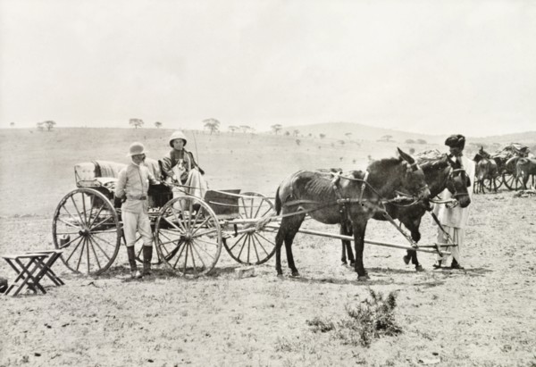 A Uganda Railways Chief Engineer. A Uganda Railways Chief Engineer stands beside a horse-drawn