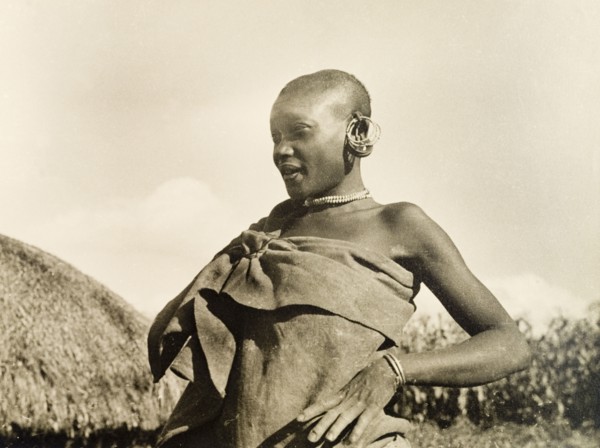 A married Kikuyu woman. Portrait of a married Kikuyu woman, dressed in a wrap-around cloth tied at