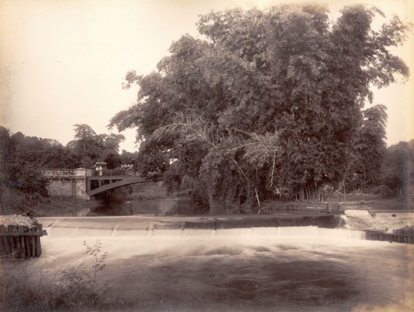 Weir on the Martha Brae River. A footbridge crosses a weir on the Martha Brae River. Trelawny,