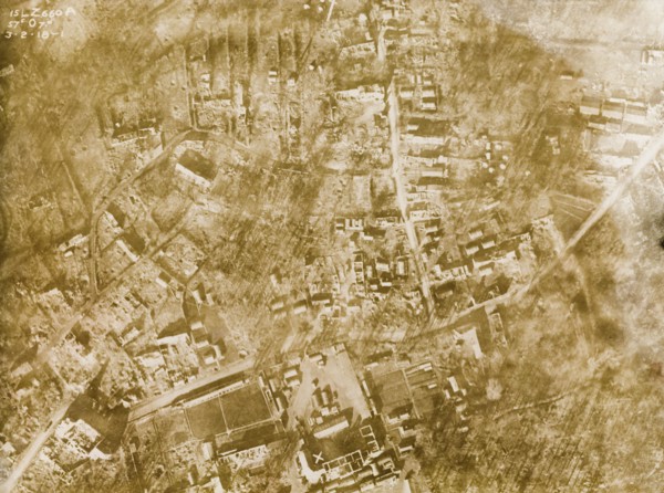 Aerial view of a bomb-damaged village. One of a series of British aerial reconnaissance photographs
