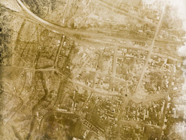 Aerial view of a bomb-damaged village. One of a series of British aerial reconnaissance photographs